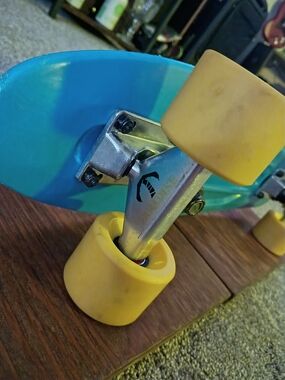 Vintage-Style Blue Cruiser Skateboard with Yellow Wheels